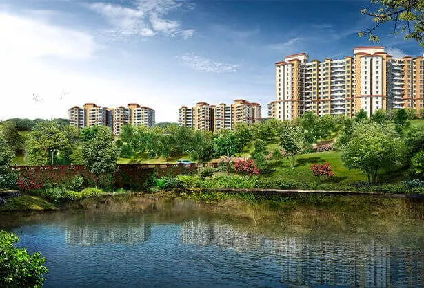 Misty Greens Lake View at Paranjape Forest Trails Bhugaon - Serene Water Body Surrounded by Lush Greenery and Residential Towers